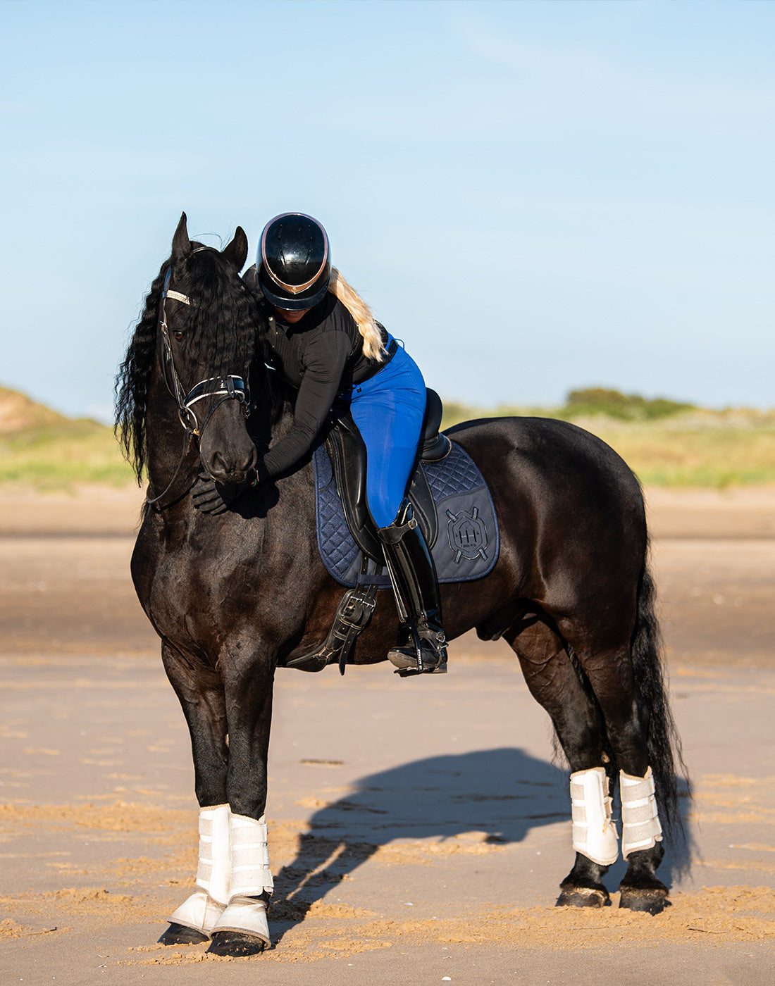 Horse and rider wearing HORZEHOODS bundle collection in Navy