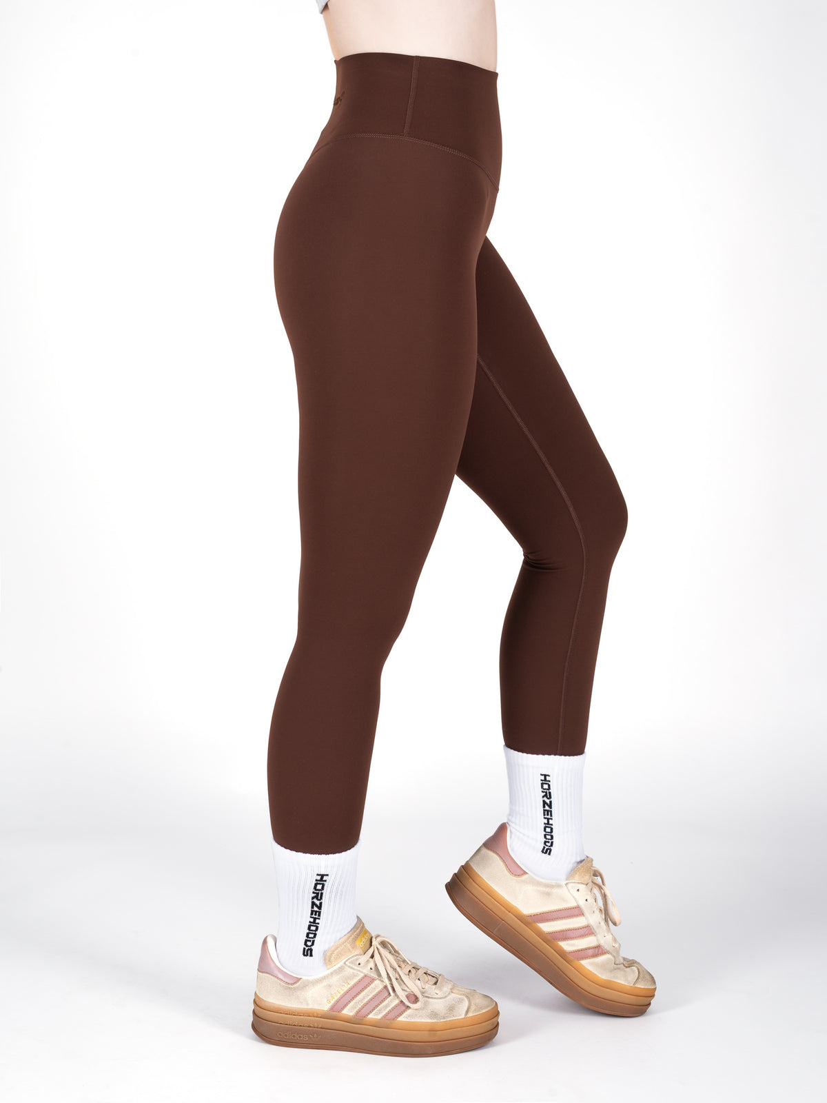 Horzehoods Brown Basicz comfort base leggings, a close fitting high waisted base layer, side view worn by a model