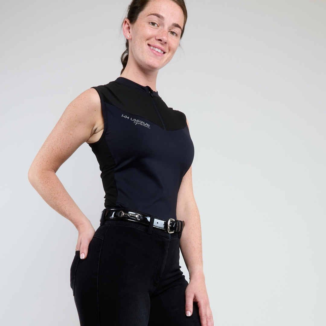 Equestrian rider wearing HORZEHOODS® Black Air2 Sleeveless Base Layer – Perfect for Clinics, Training, and Riding