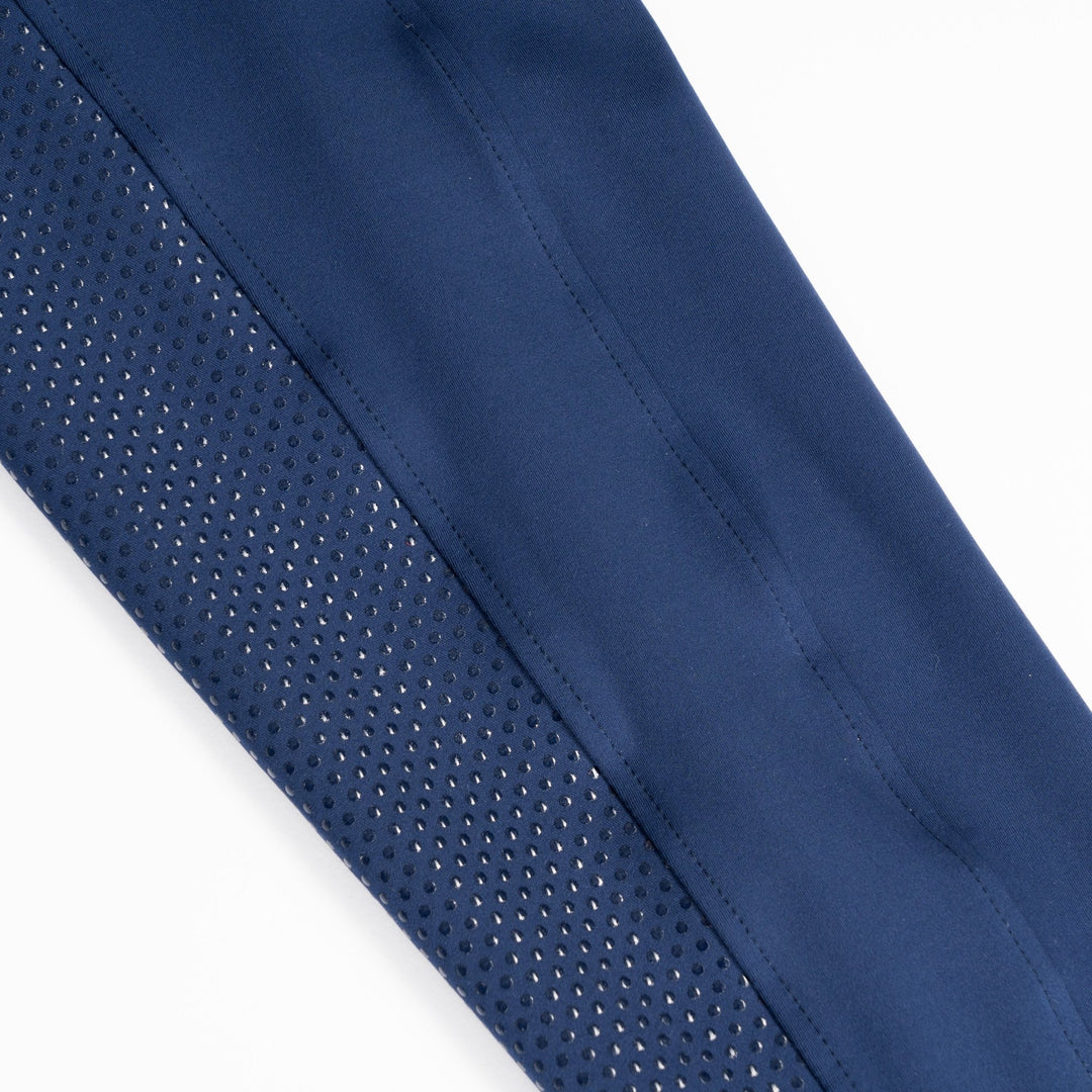 showing a close up of the gel rip on the bretahable air criotch seam free riding leggings